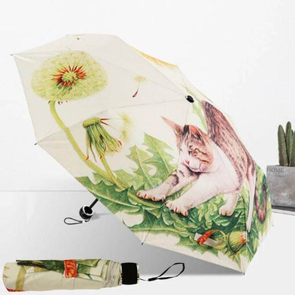 Cat Pattern Folding Umbrella for Sun and Rain Protection featuring playful cat and dandelion design, compact portable UV UPF 40+ silver-coated umbrella
