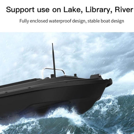 GPS RC Fishing Boat With Double Motors For Outdoor Use EU Plug - black ABS hull in choppy lake water showing waterproof design and antenna