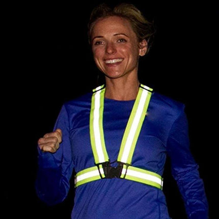 Reflective Neon Green Safety Vest for Night Running and Riding shown on smiling runner wearing LED reflective straps at night