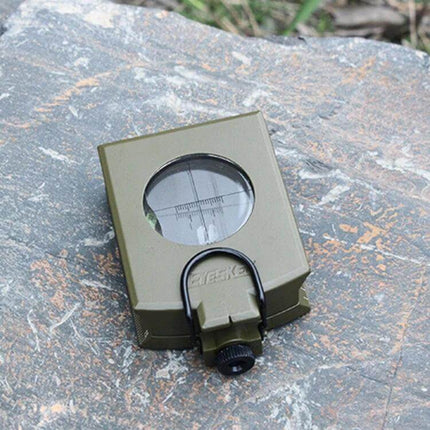 GoldGood Pocket Prismatic Compass For Outdoor Navigation With Luminous Display compact metal housing on rock for hiking and camping navigation