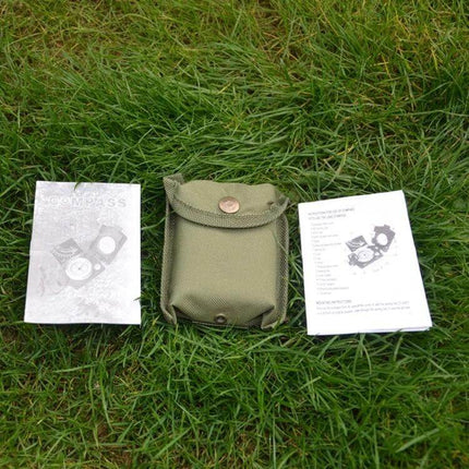 GoldGood Pocket Prismatic Compass For Outdoor Navigation With Luminous Display compact kit with olive pouch and instruction manuals on grass