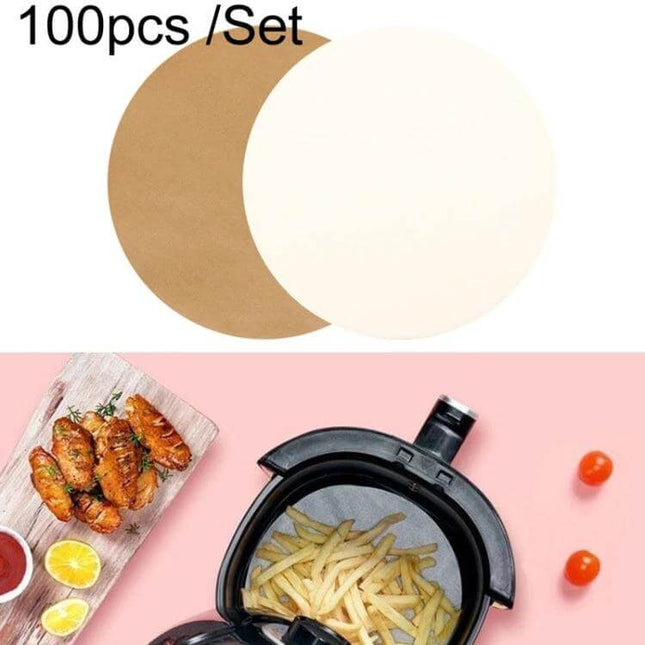 Oil-Absorbing Round Parchment Paper With Hole For Air Fryer And Oven shown in round sheets under air fryer with fries and wings