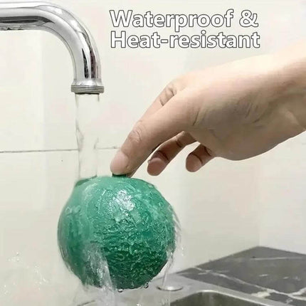Outdoor Citrus Fruit Fly Mosquito Trap Sticky Ball Green hung under tap to show waterproof, chemical-free adhesive catching flying pests