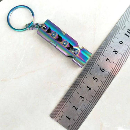 Outdoor Survival Whistle With Key Ring Stainless Steel rainbow titanium finish compact 440 stainless steel whistle on key ring next to ruler