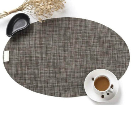 Oval Silicone Placemats Non Slip For Dining Table Decor gray woven oval placemat with coffee cup and small dish, non-slip silicone table protector