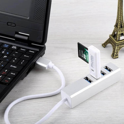 Versatile Four-Port USB 3.0 Hub for Connecting Multiple Devices Easily connected to laptop with USB flash drive and SD card