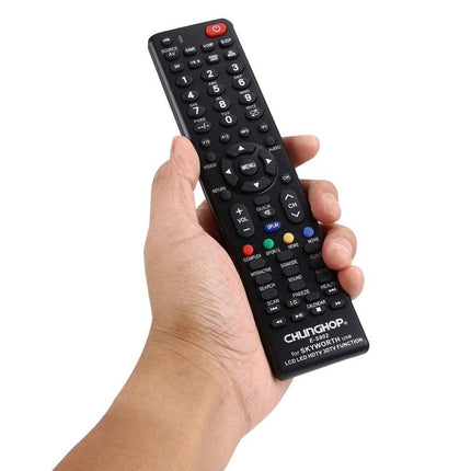 Chunghop Universal Remote Controller for Skyworth LED Televisions held in hand, black replacement remote with full button layout