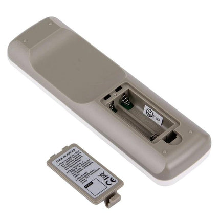 Chunghop Universal Remote Controller for Air Conditioner Operation showing open battery compartment and removed cover, light gray plastic remote