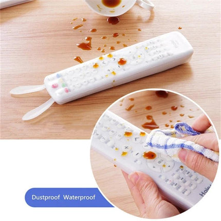Waterproof Silicone Protective Cover for Smart TV Remotes, 5 Pack - waterproof dustproof silicone remote cover being wiped clean after spill