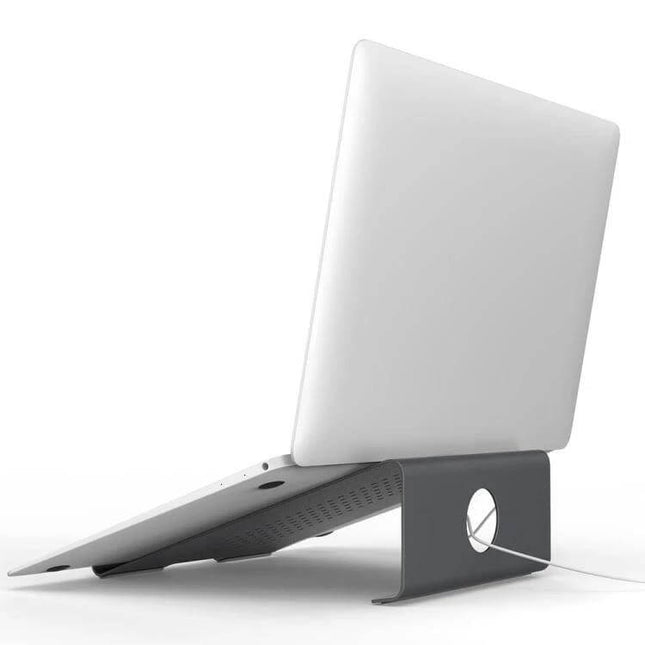 Aluminum Laptop Stand for Elevated Viewing and Cooling holding a laptop to improve posture and airflow