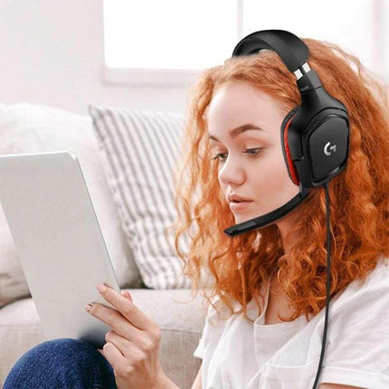 Logitech Stereo Gaming Headset For Comfortable Long Sessions worn by gamer with mic, cushioned headband and ear pads for marathon play