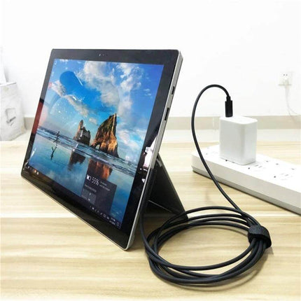 Magnetic USB-C to 6 Pin Charging Cable for Microsoft Surface Pro 7/6/5 connected to Surface tablet with magnetic connector and USB-C power adapter