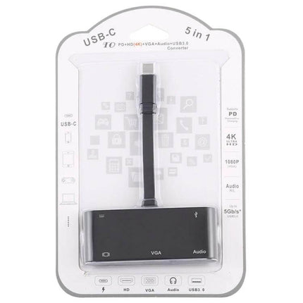 USB-C Multi-Port Adapter for HDMI, VGA, and Audio Output showing black adapter in retail packaging with labeled HDMI, VGA, and Audio ports
