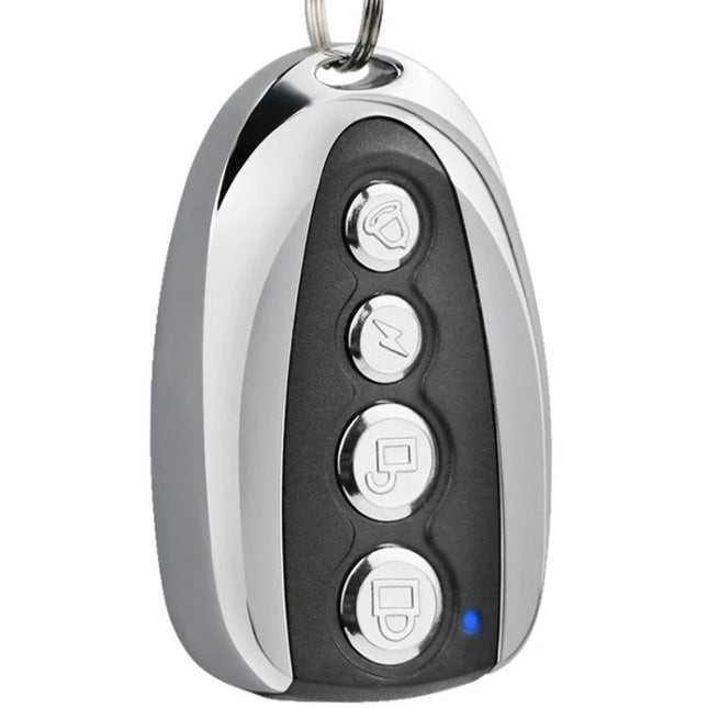 Compact Universal Garage Door Remote Control Duplicator in Metal - chrome keychain duplicator with four buttons for easy car key access