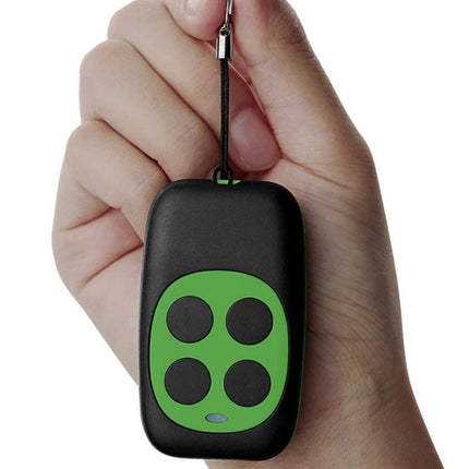 Wireless Four-Key Copying Remote for Garage Doors held in hand showing durable metal body and four-button layout