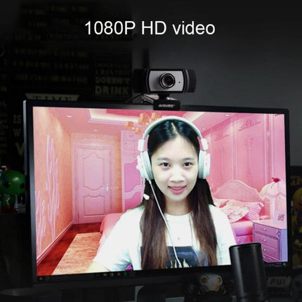 Aoni C33 Plug and Play Webcam for Teleconferencing and Live Streaming showing 1080P video on monitor with headset user