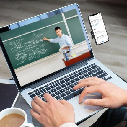 Aluminum Alloy Magnetic Suction Phone Bracket for Laptops, Silver mounted to laptop creating dual-screen setup with phone showing messages