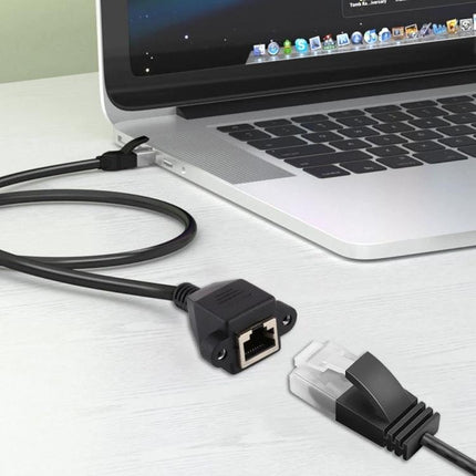 RJ45 Network Extension Cable for Panel Mounting, 0.3 Meters - male to female RJ45 panel mount extension beside laptop