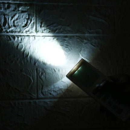 Chunghop Universal A/C Remote with Built-In Flashlight Illuminating Wall In Low Light