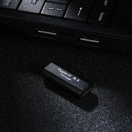 Aluminum Alloy USB-C Female to Female Adapter for Easy Use black Type-C 3.1 inline coupler next to laptop USB ports