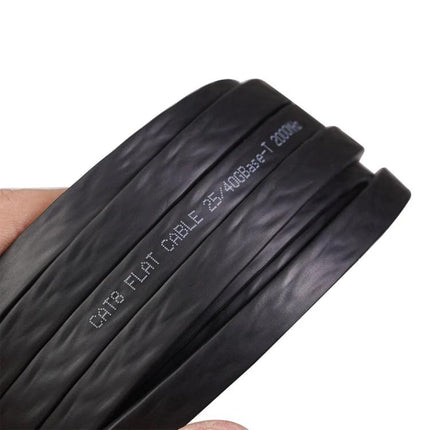 Double Shielded Flat CAT8 Ethernet Cable, 1 Meter Length - black flat 9mm x 3mm cable coiled for home and office high-speed connections