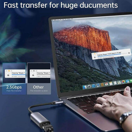 USB-C to Gigabit RJ45 Female Adapter for Ethernet Connections plugged into laptop enabling fast wired file transfers and stable internet