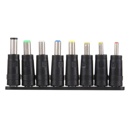 8-in-1 Multi-Interface Power Adapter for Various Laptops showing eight interchangeable 5.5x2.1mm female connector tips on a black holder