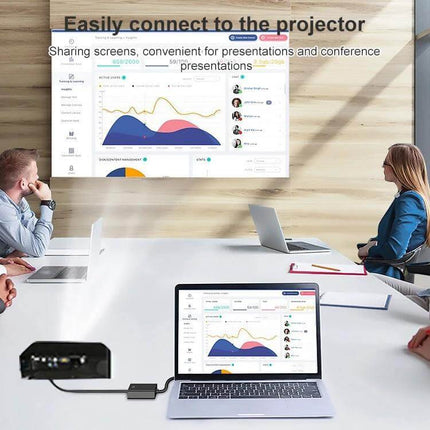 VGA to HDMI Converter with 1080P Support and Audio Cable for Displays showing laptop connected to projector and monitor in a meeting room