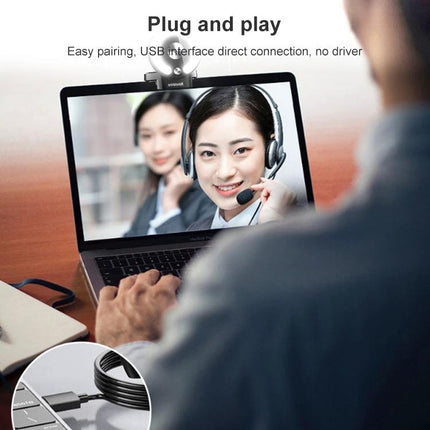 Landshine 2K Webcam with Ring Light for Video Calls showing plug-and-play setup on laptop with clear video in low light