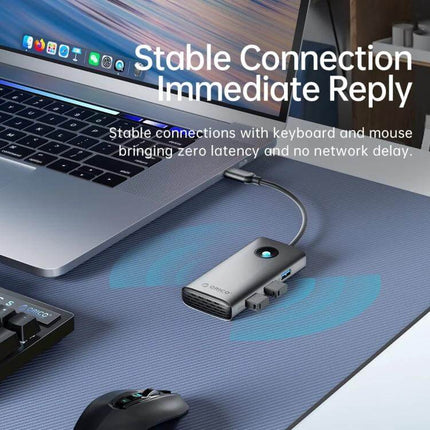 Orico 5-in-1 USB-C Docking Station for Laptop Connectivity connected to a laptop showing HDMI, USB ports and stable connection