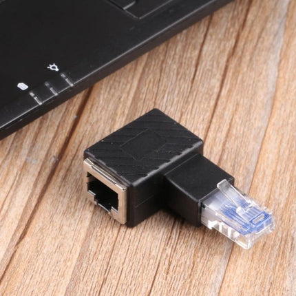 RJ45 90-Degree Extension Adapter for Ethernet Cables black angled connector next to laptop to protect ports and manage cables in tight spaces