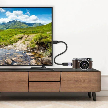 Portable HDMI to Mini DisplayPort Adapter for Device Connections linking camera to TV for high-resolution display