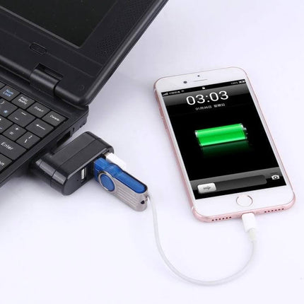 Portable USB Hub with 180-Degree Rotation for Device Connections attached to laptop powering phone and flash drive, compact cable organizer