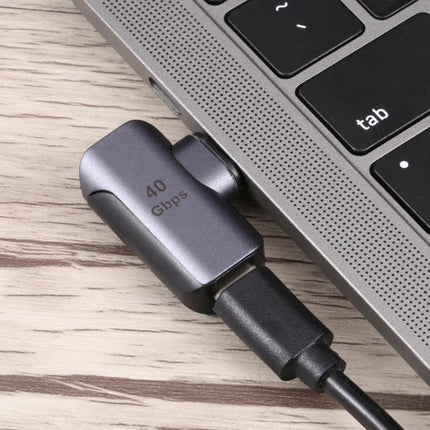 USB-C Elbow Adapter for Daily Device Connections plugged into a laptop port, right-angle aluminum alloy design reducing cable strain