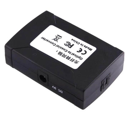 Optical Toslink to Coaxial RCA Digital Audio Signal Converter black compact box showing DC 9V and ports for TV to sound system hookup