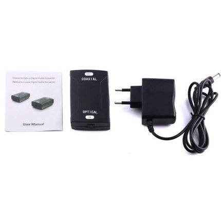 Optical Toslink to Coaxial RCA Digital Audio Signal Converter shown with power adapter and user manual for TV to sound system hookup