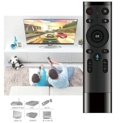 Wireless Remote Control with Voice and Gyroscope for TV and Computers - sleek black remote shown controlling TV and PC media