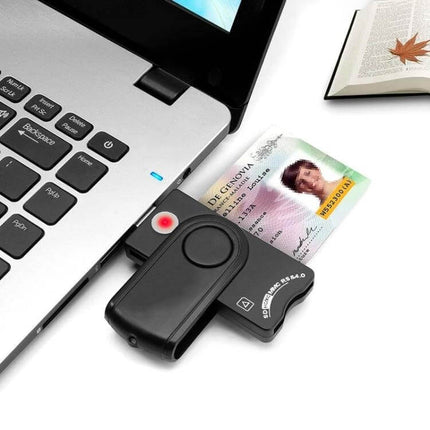 Rocketek Multi-Card Reader for Smart and Memory Cards connected to laptop reading ID card and SD card