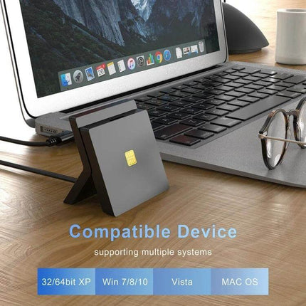 Rocketek Dual Smart Card and SIM Reader for Everyday Access USB smart card and SIM reader next to laptop for secure ID and data transfer