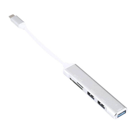USB-C Multi-Port Hub with SD Card Reader and USB Ports silver dongle with SD slot and multiple USB ports for laptop connectivity