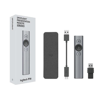 Logitech Spotlight Wireless Presentation Remote Control shown with USB receiver, charging cable, case and packaging for professional presentations