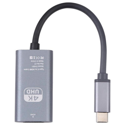 USB-C Adapter for Connecting Devices to HDTV in Daily Use - gray compact 4K UHD dongle with short cable