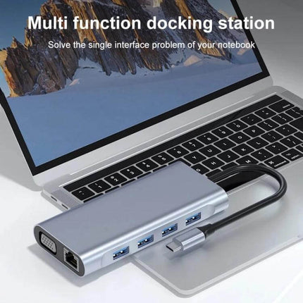 USB-C 11-in-1 Docking Station with Gigabit Ethernet Port connected to laptop showing multiple USB and video ports