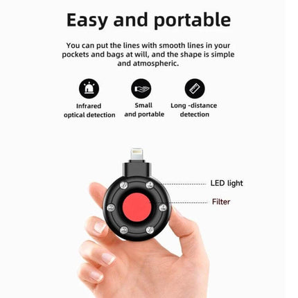 Portable Infrared Scanner for Detecting Hidden Cameras in Hotels - compact 8-pin plug device shown in hand with LED light and filter, easy portable design