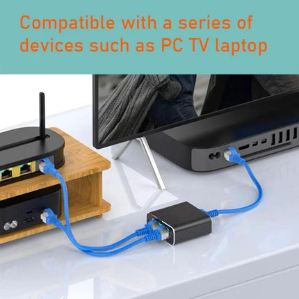 OZHW3 1 to 2 RJ45 Ethernet Splitter for Network Sharing connected between router and two devices on a desk for home office and gaming