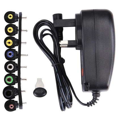 Universal UK Plug Power Adapter for Pedals and Effects, black regulated adapter with multiple interchangeable DC tips for pedals and effects