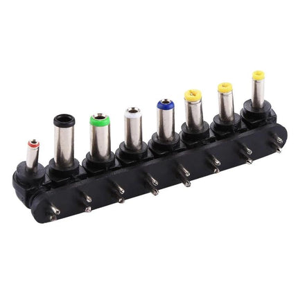 Universal EU Plug Power Adapter with USB Port and Multiple Tips showing assorted detachable DC tips on a compact travel-ready adapter