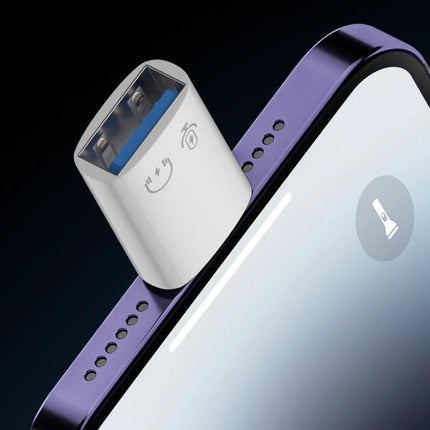 OTG Adapter for Everyday File Transfers on Trips and at Home - compact aluminum OTG connector plugged into smartphone for USB drive access