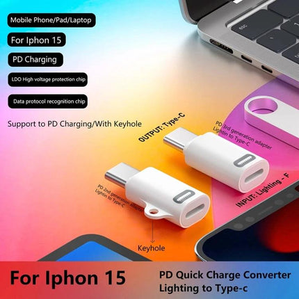 Compact USB Adapter for Everyday Device Connections at Home - white PD charging Lightning to Type-C adapter beside laptop and phones