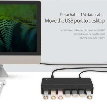 Orico 7-Port USB 3.0 Hub for Expanding Desktop Connections shown on a desk with detachable 1M cable and multiple USB devices connected